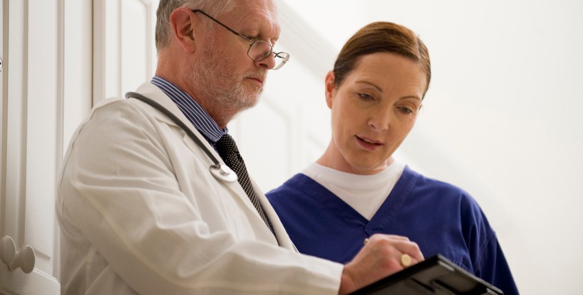 A doctor and nurse medical team.